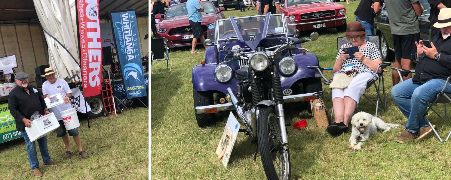Two men holding prizes and a purple car and motorbike