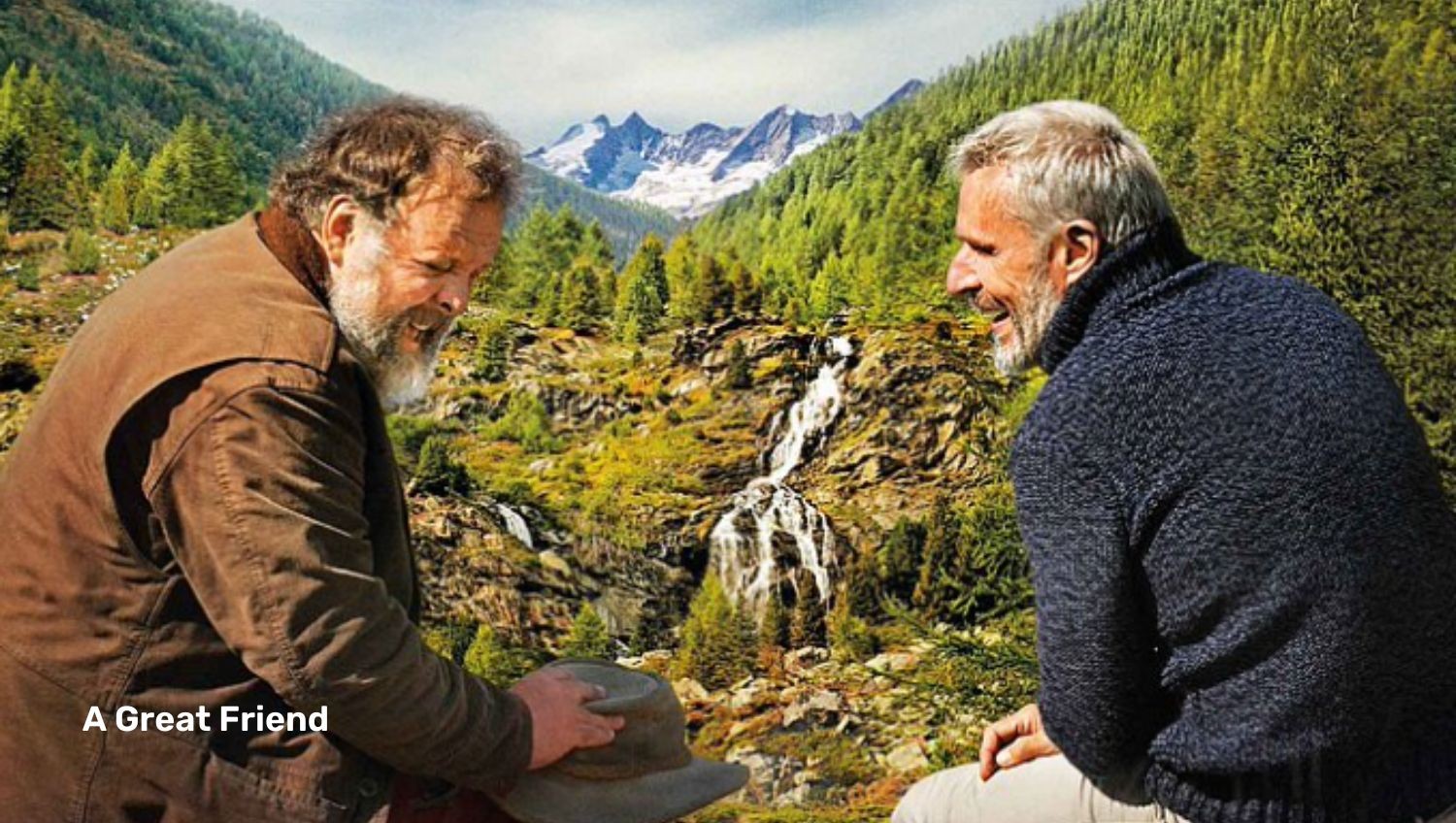 Two men sitting on mountain side