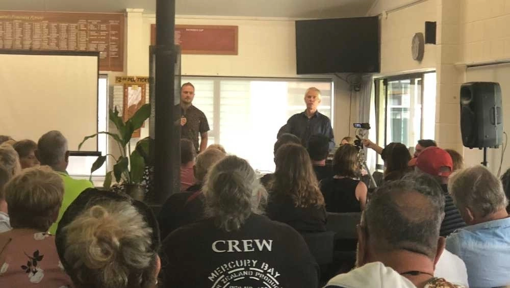 People at public meeting