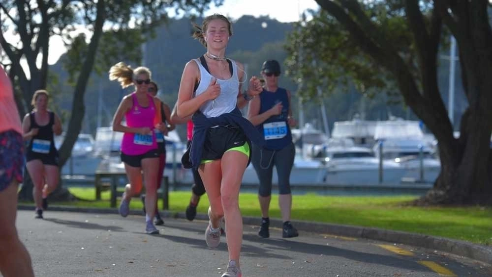 Girl running on road