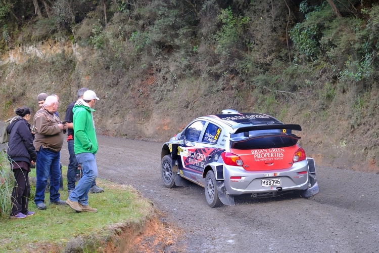 Rally car and spectators Rally car and spectators
