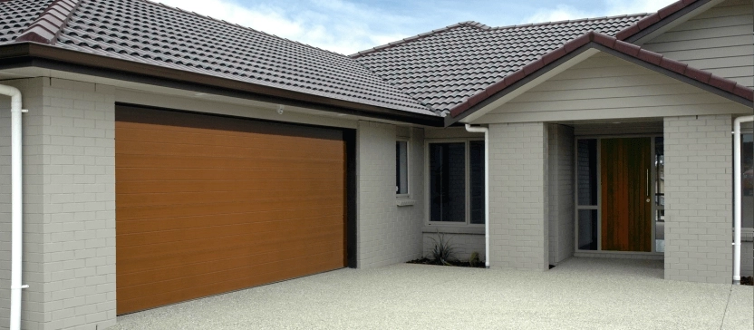 Brick house with brown garage door