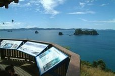 Te Whanganui-A-Hei (Cathedral Cove) Marine Reserve information panels overlooking Cathedral Cove