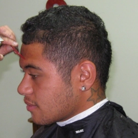 Boy getting haircut
