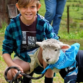 Boy with pet lamb
