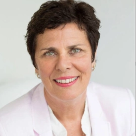 Robyn Turner, woman in white shirt smiling