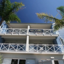 Building with palm trees
