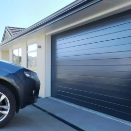 Car parked by garage door