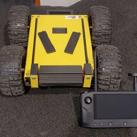 Yellow rectangular robot with 4 wheels