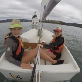 Two girls in sailing boat