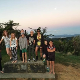 Children in front of sunset