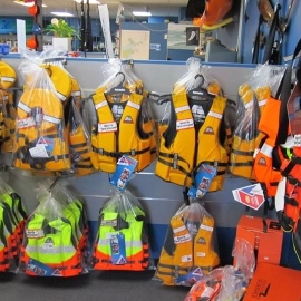 Life jackets on wall hooks