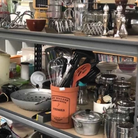 Kitchen utensils on shelf