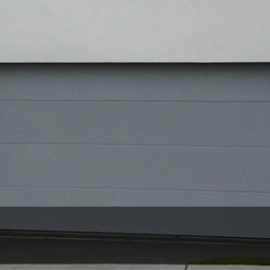 Flatline Smooth Panel sectional Garage doors by Doors 2000 Coromandel