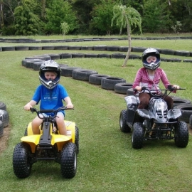 Kids riding 50cc bikes