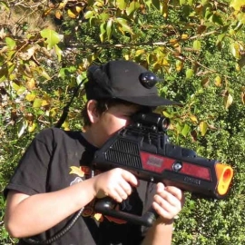 Boy with laser tag gun