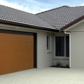 Brick house with brown garage door