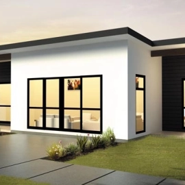 White and black home with lights on