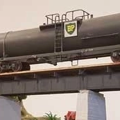 model trio on bridge