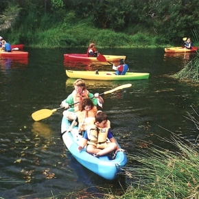 Children in kayaks